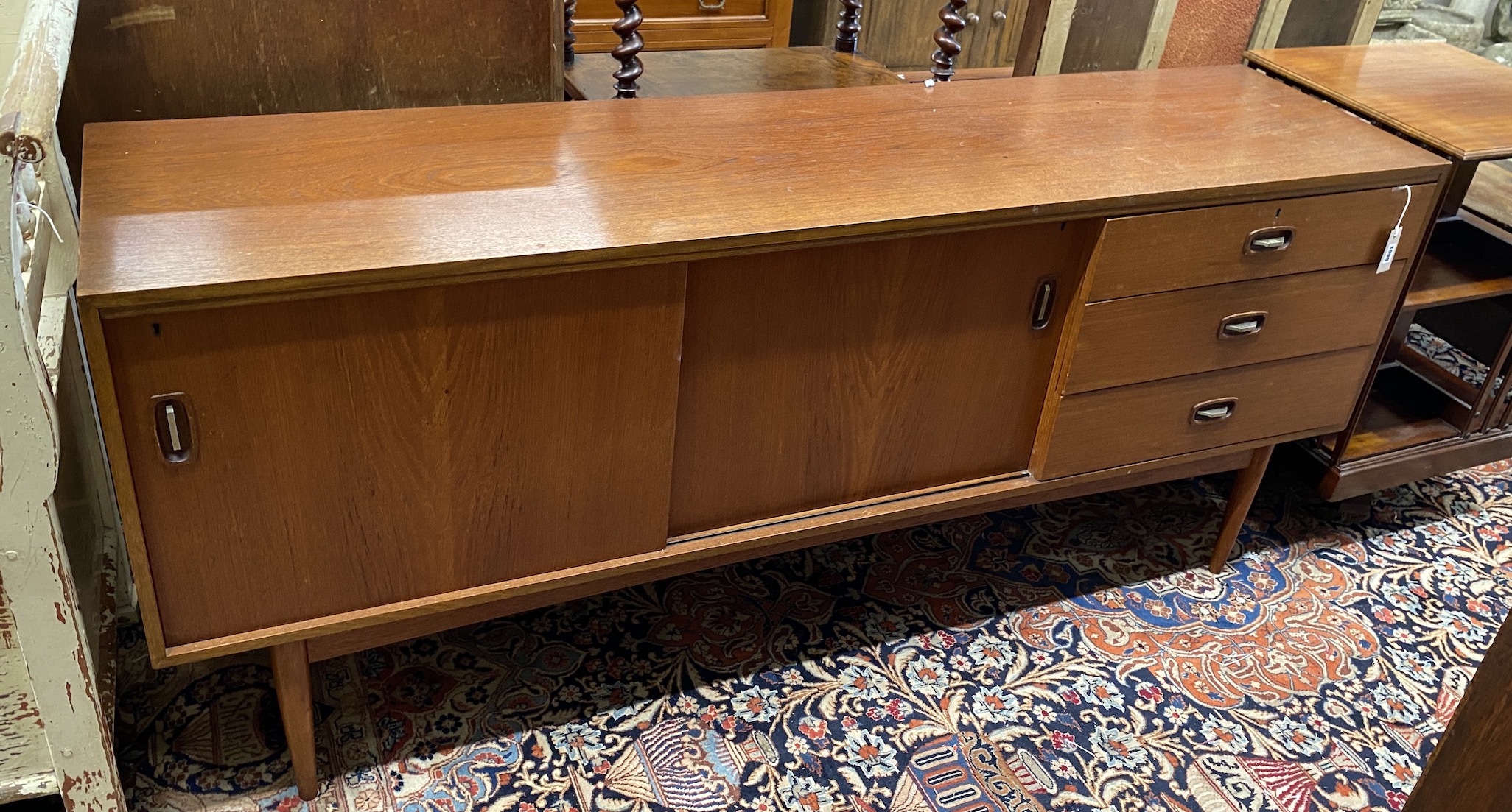 A mid 20th century Austinsuite teak sideboard, length 183cm, depth 46cm, height 78cm